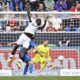 Leverkusen's Victor Boniface fails to beat Hoffenheim goalkeeper Oliver Baumann during a match between TSG Hoffenheim and Bayer 04 Leverkusen on Saturday, Sept. 14, 2024 in Sinsheim, Germany. (Uwe Anspach/dpa via AP)