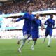 Chelsea's Cole Palmer (centre) celebrates scoring his side's second goal of the game with team-mates during a British Premier League soccer match between Chelsea and Brighton at Stamford Bridge, London, Saturday, Sept. 28, 2024. (Bradley Collyer/PA via AP)