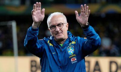 Brazil's coach Dorival Junior enters the field prior to a qualifying soccer match for the FIFA World Cup 2026 against Ecuador at Couto Pereira Stadium in Curitiba, Parana state, Brazil, Friday, Sept. 6, 2024. (AP Photo/Silvia Izquierdo)