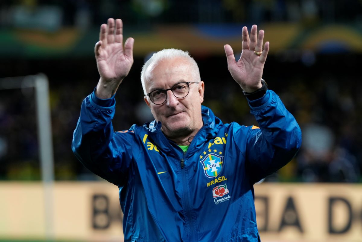 Brazil's coach Dorival Junior enters the field prior to a qualifying soccer match for the FIFA World Cup 2026 against Ecuador at Couto Pereira Stadium in Curitiba, Parana state, Brazil, Friday, Sept. 6, 2024. (AP Photo/Silvia Izquierdo)