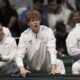 Italy's Jannick Sinner, center, shouts indications to Italy's Matteo Berrettini during a men's singles tennis Davis Cup tennis match between Berrettini and Botic Van Zandschulp of the Netherlands, at the Unipol arena, in Bologna, Italy, Sunday, Sept. 15, 2024. (Michele Nucci/LaPresse via AP)