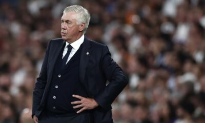 Real Madrid's head coach Carlo Ancelotti grimaces during the Spanish La Liga soccer match between Real Madrid and Betis at the Santiago Bernabeu stadium in Madrid, Spain, Sunday, Sept. 1, 2024. (AP Photo/Pablo Garcia)