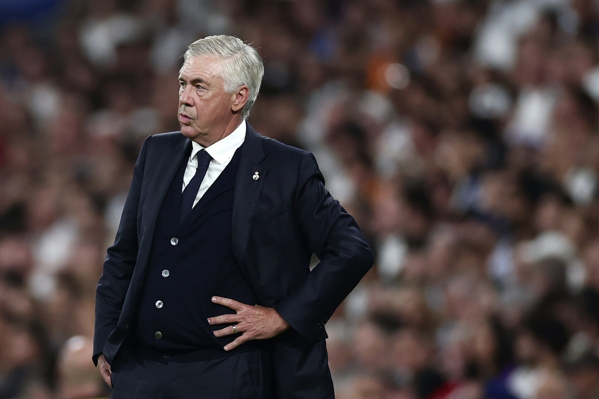 Real Madrid's head coach Carlo Ancelotti grimaces during the Spanish La Liga soccer match between Real Madrid and Betis at the Santiago Bernabeu stadium in Madrid, Spain, Sunday, Sept. 1, 2024. (AP Photo/Pablo Garcia)