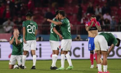 Bolivia's players celebrate after beating 2-1 Chile during a qualifying soccer match for the FIFA World Cup 2026 at the National Stadium in Santiago, Chile, Tuesday, Sept. 10, 2024. (AP Photo/Esteban Felix)