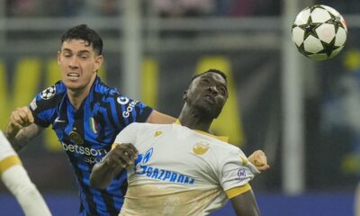 Red Star's Silas, right, duels for the ball with Inter Milan's Alessandro Bastoni during the Champions League opening phase soccer match between Inter Milan and Red Star, at the San Siro stadium in Milan, Italy, Tuesday, Oct. 1, 2024. (AP Photo/Luca Bruno)