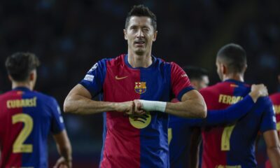 Barcelona's Robert Lewandowski celebrates after scoring his side's opening goal during the Champions League soccer match between Barcelona and Young Boys at the Lluis Companys Olympic Stadium in Barcelona, Spain, Tuesday, Oct. 1, 2024. (AP Photo/Joan Monfort)