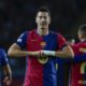 Barcelona's Robert Lewandowski celebrates after scoring his side's opening goal during the Champions League soccer match between Barcelona and Young Boys at the Lluis Companys Olympic Stadium in Barcelona, Spain, Tuesday, Oct. 1, 2024. (AP Photo/Joan Monfort)