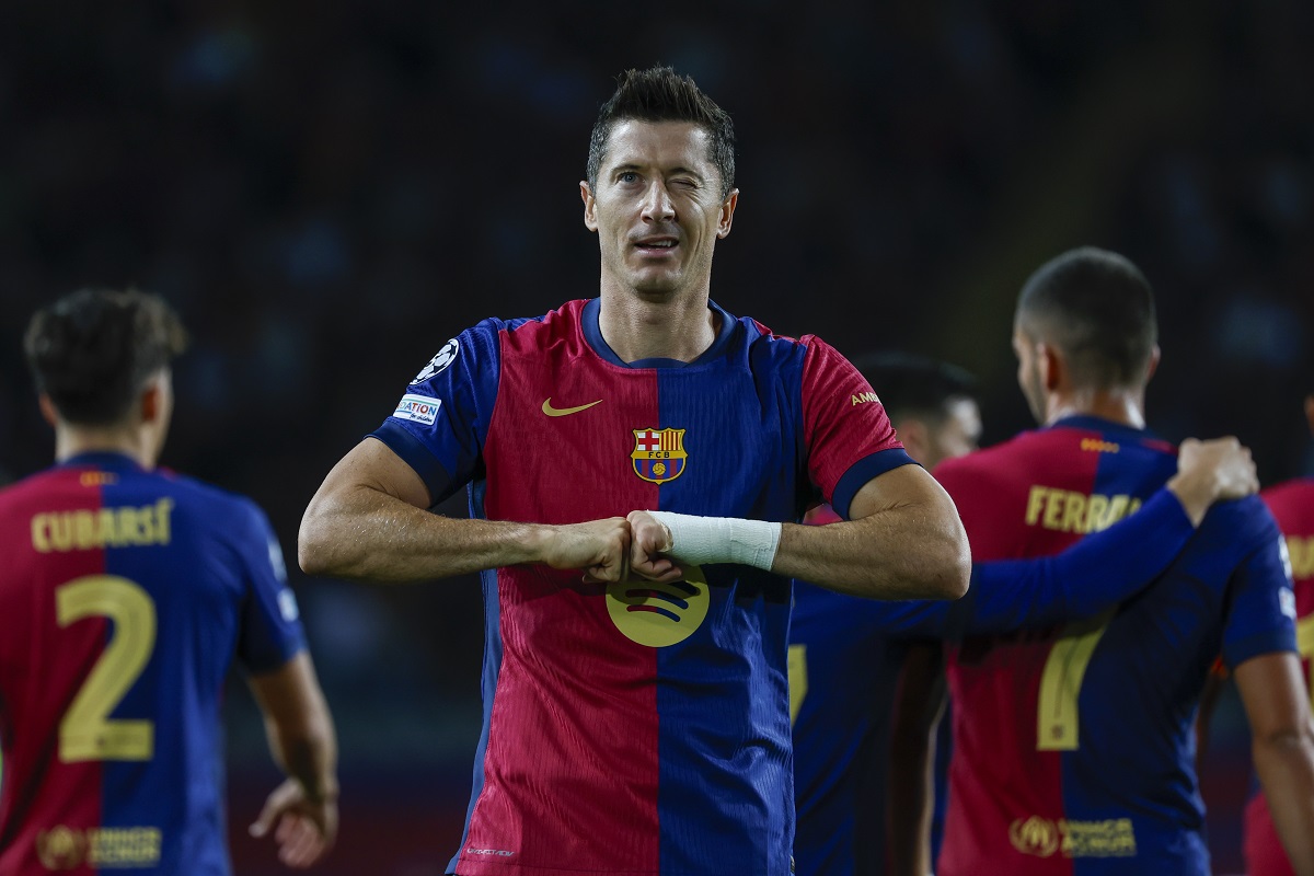 Barcelona's Robert Lewandowski celebrates after scoring his side's opening goal during the Champions League soccer match between Barcelona and Young Boys at the Lluis Companys Olympic Stadium in Barcelona, Spain, Tuesday, Oct. 1, 2024. (AP Photo/Joan Monfort)