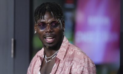 French professional soccer player Paul Pogba stands in a VIP suite at the start of an MLS soccer match between Inter Miami and Charlotte FC, Saturday, Sept. 28, 2024, in Fort Lauderdale, Fla. (AP Photo/Rebecca Blackwell)