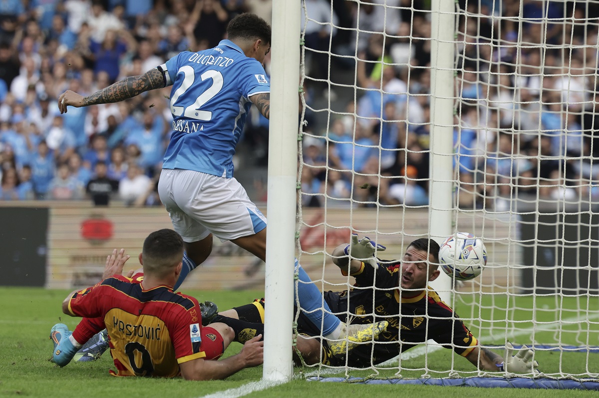 Napoli's Giovanni Di Lorenzo, centre, scores the opening goal during the Serie A soccer match between Napoli and Lecce at the Diego Armando Maradona Stadium in Naples, Italy, Saturday, Oct. 26, 2024. (Alessandro Garofalo/LaPresse via AP)