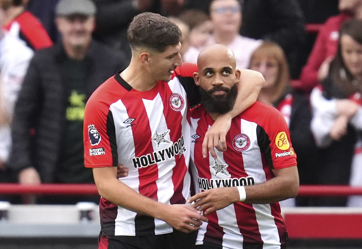 Brentford's Bryan Mbeumo, right, celebrates scoring his side's third goal of the game, during the English Premier League soccer match between Brentford and Ipswich Town, at the Gtech Community Stadium, in London, Saturday, Oct. 26, 2024. (John Walton/PA via AP)