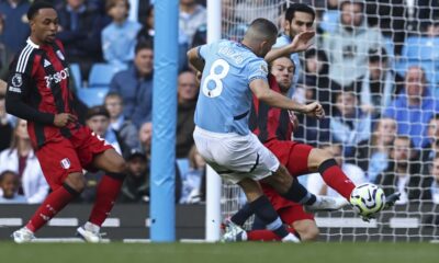 Manchester City's Mateo Kovacic, center, scores his side's second goal during the English Premier League soccer match between Manchester City and Fulham at Etihad Stadium in Manchester, England, Saturday, Oct. 5, 2023. (AP Photo/Darren Staples)