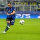 Inter Milan's Hakan Calhanoglu scores the opening goal during the Champions League opening phase soccer match between Inter Milan and Red Star, at the San Siro stadium in Milan, Italy, Tuesday, Oct. 1, 2024. (AP Photo/Luca Bruno)