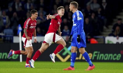 Nottingham Forest's Chris Wood, centre, celebrates scoring his side's first goal of the game during the Premier League match at the King Power Stadium, in Leicester, England, Friday Oct. 25, 2024. (Mike Egerton/PA via AP)