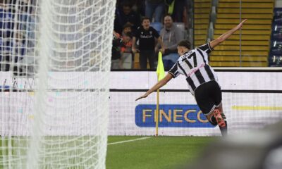 Udinese's Lorenzo Lucca celebrates after scoring their side's first goal of the game during the Serie A soccer match between Udinese and Cagliari at the Bluenergy Stadium in Udine, Italy, Friday, Oct. 25, 2024. (Andrea Bressanutti/LaPresse via AP)