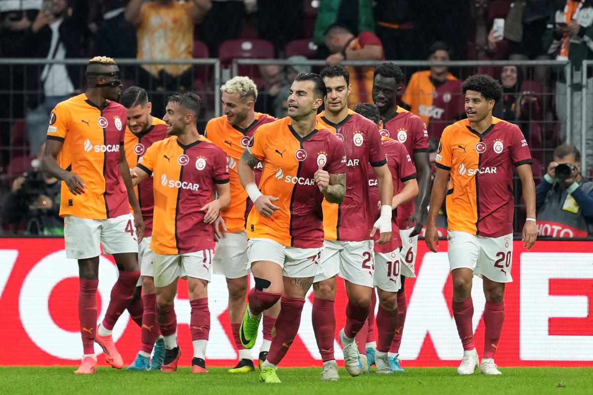 Galatasaray's players celebrate their side's second goal during the Europa League opening phase soccer match between Galatasaray and Elfsborg at Ali Sami Yen stadium, in Istanbul, Turkey, Wednesday, Oct. 23, 2024. Galatasaray won 4-3. (AP Photo/Khalil Hamra)