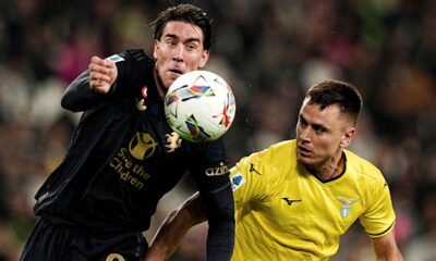 Juventus' Dusan Vlahovic and Lazio's Patric vie for the ball during the Serie A soccer match at the Allianz Stadium in Torino, Italy, Sunday, Oct. 19, 2024. (Marco Alpozzi/LaPresse via AP)