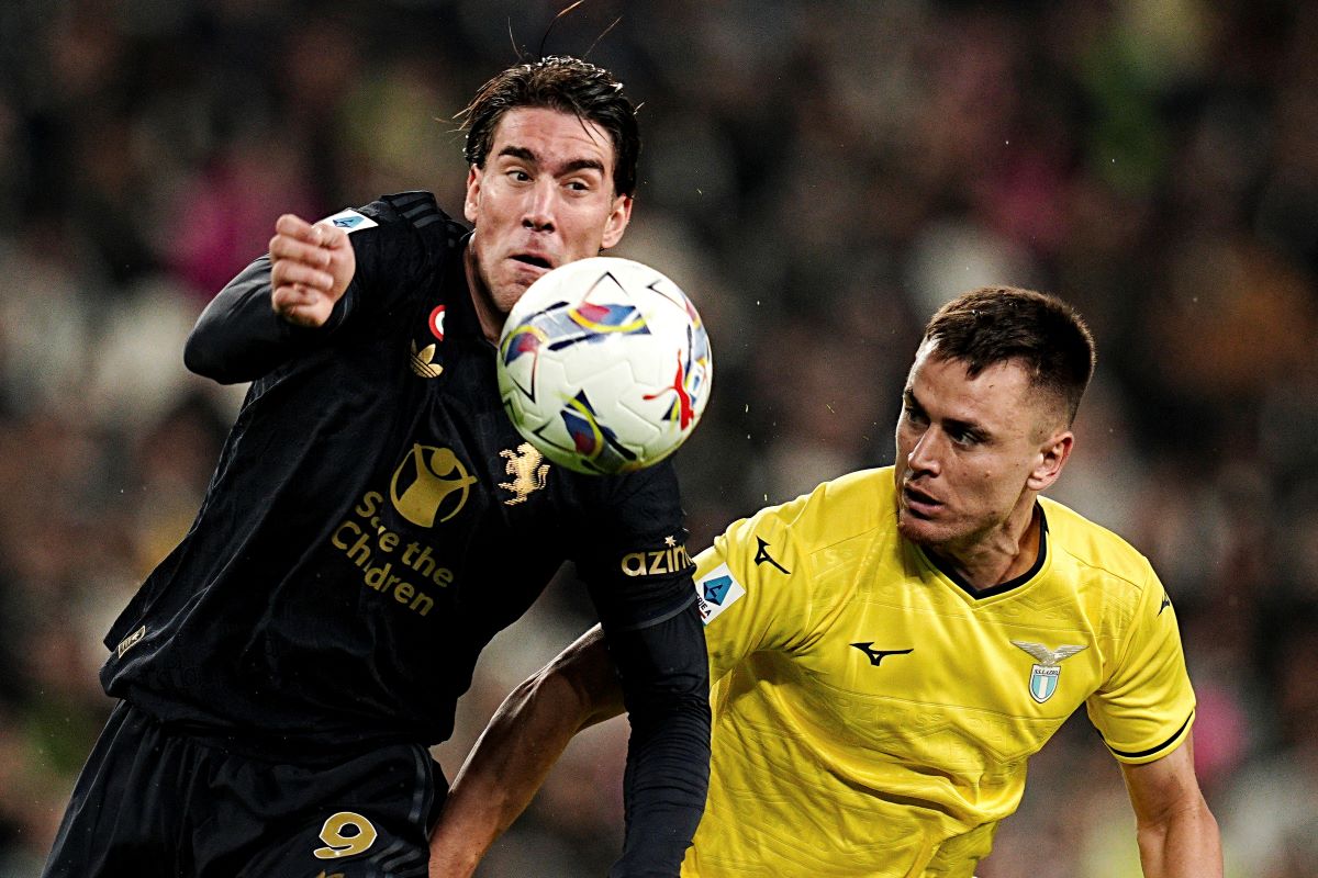 Juventus' Dusan Vlahovic and Lazio's Patric vie for the ball during the Serie A soccer match at the Allianz Stadium in Torino, Italy, Sunday, Oct. 19, 2024. (Marco Alpozzi/LaPresse via AP)