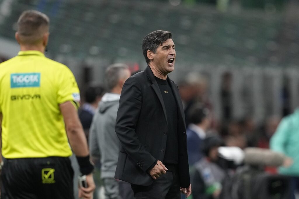 AC Milan's head coach Paulo Fonseca reacts during the Serie A soccer match between AC Milan and Udinese at the San Siro Stadium, in Milan, Italy, Saturday, Oct. 19, 2024. (AP Photo/Antonio Calanni)