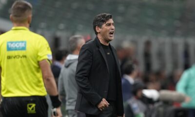 AC Milan's head coach Paulo Fonseca reacts during the Serie A soccer match between AC Milan and Udinese at the San Siro Stadium, in Milan, Italy, Saturday, Oct. 19, 2024. (AP Photo/Antonio Calanni)