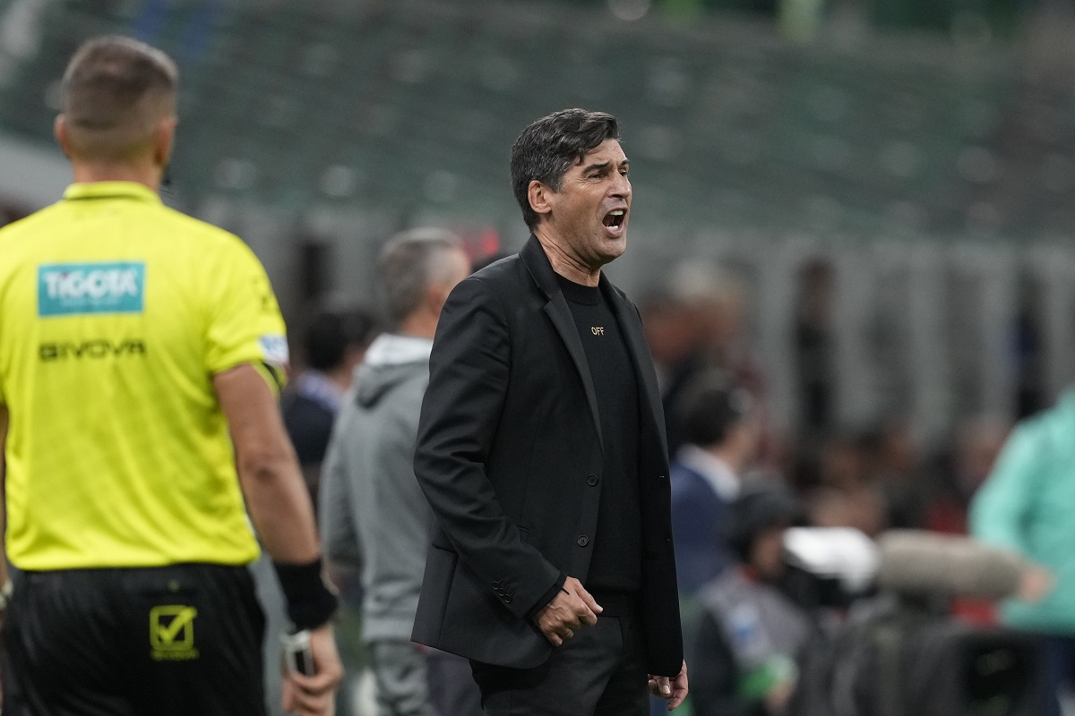 AC Milan's head coach Paulo Fonseca reacts during the Serie A soccer match between AC Milan and Udinese at the San Siro Stadium, in Milan, Italy, Saturday, Oct. 19, 2024. (AP Photo/Antonio Calanni)