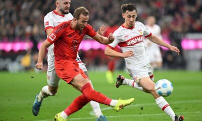 Munich's Harry Kane, left, plays against Stuttgart's Jeff Chabot during a German Bundesliga soccer match between FC Bayern Munich and VfB Stuttgart, in Munich, Germany, Saturday, Oct. 19, 2024. (Sven Hoppe/dpa via AP)