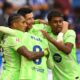 Barcelona's Robert Lewandowski, center, celebrates after scoring his side's 2nd goal against Alaves during a Spanish La Liga soccer match at the Mendizorroza stadium in Vitoria-Gasteiz, Spain, Sunday, Oct. 6, 2024. (AP Photo/Miguel Oses)