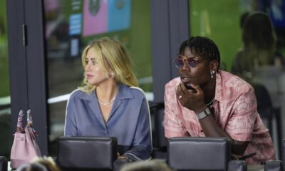 French professional soccer player Paul Pogba, right, watches from a VIP suite at the start of an MLS soccer match between Inter Miami and Charlotte FC, Saturday, Sept. 28, 2024, in Fort Lauderdale, Fla. (AP Photo/Rebecca Blackwell)