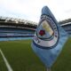 FILE - The club logo decorates a corner flag before the English Premier League soccer match between Manchester City and Newcastle United at the Etihad Stadium in Manchester, England, Saturday, Sept. 1, 2018. (AP Photo/Jon Super, File)