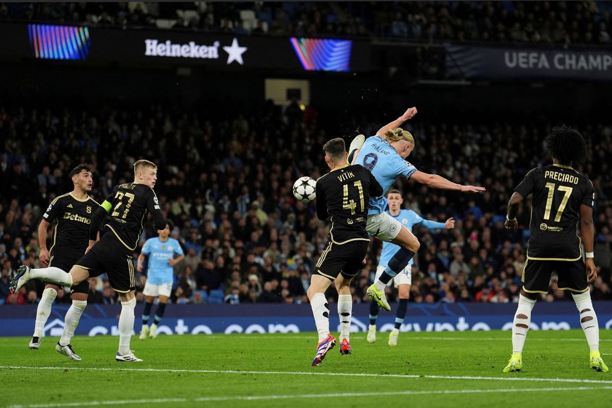 Manchester City's Erling Haaland scores his side's second goal during the Champions League opening phase soccer match between Manchester City and Sparta Praha at the Etihad Stadium in Manchester, England, Wednesday, Oct.23 , 2024. (Martin Rickett/PA via AP)