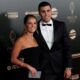 Spanish player Rodri, right, and his partner Laura Iglesias arrive for the 68th Ballon d'Or (Golden Ball) award ceremony at Theatre du Chatelet in Paris, Monday, Oct. 28, 2024. (AP Photo/Michel Euler)