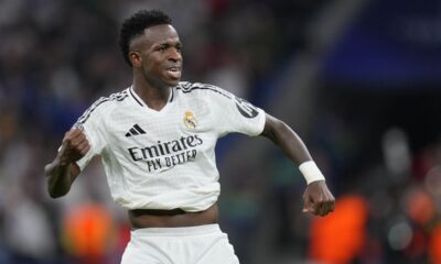 Real Madrid's Vinicius Junior celebrates after scoring his side's fourth goal during the Champions League opening phase soccer match between Real Madrid and Borussia Dortmund at the Santiago Bernabeu stadium in Madrid, Tuesday, Oct. 22, 2024. Real Madrid won 5-2. (AP Photo/Manu Fernandez)