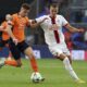 Rapid Wien's Nenad Cvetkovic, right, and Basaksehir's Krzysztof Piatek, fight for the ball during the Europa Conference League opening phase soccer match between Basaksehir and SK Rapid Wien at the Basaksehir Fatih Terim stadium in Istanbul, Turkey, Wednesday, Oct. 2, 2024. (Serkan Hacioglu/Dia Photo via AP)