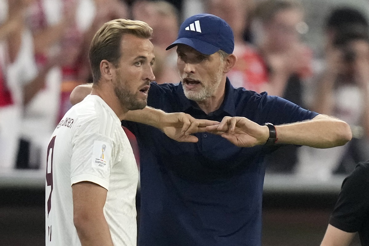 FILE - Then Bayern's head coach Thomas Tuchel talks to Bayern's Harry Kane during the German Super Cup final between FC Bayern Munich and RB Leipzig at the Allianz Arena stadium in Munich, Germany, Saturday, Aug. 12, 2023. (AP Photo/Matthias Schrader, File)