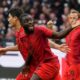 Bayern's Dayot Upamecano, centre, celebrates after scoring his side's second goal during the German Bundesliga soccer match between Eintracht Frankfurt and Bayern Munich in Frankfurt, Germany, Sunday, Oct. 6, 2024. (AP Photo/Michael Probst)