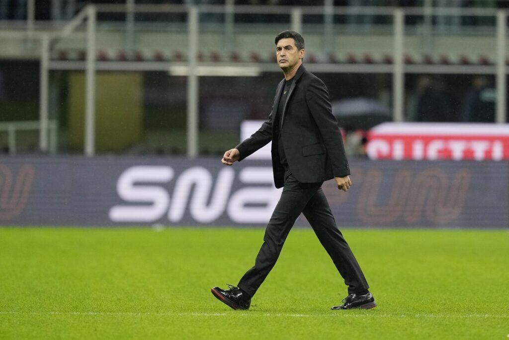 AC Milan's head coach Paulo Fonseca walks after the Serie A soccer match between AC Milan and Udinese at the San Siro Stadium, in Milan, Italy, Saturday, Oct. 19, 2024. (AP Photo/Antonio Calanni)