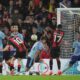 Bournemouth's Ryan Christie, centre, scores his side's opening goal during the English Premier League soccer match between Bournemouth and Arsenal at the Vitality Stadium in Bournemouth, England, Saturday, Oct. 19, 2024. (AP Photo/Kin Cheung)