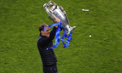 FILE - Chelsea's head coach Thomas Tuchel celebrates with the trophy after winning the Champions League final soccer match against Manchester City at the Dragao Stadium in Porto, Portugal, Saturday, May 29, 2021. (Susana Vera/Pool via AP, File)