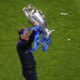 FILE - Chelsea's head coach Thomas Tuchel celebrates with the trophy after winning the Champions League final soccer match against Manchester City at the Dragao Stadium in Porto, Portugal, Saturday, May 29, 2021. (Susana Vera/Pool via AP, File)