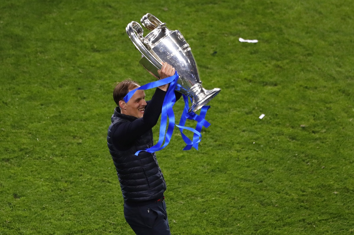 FILE - Chelsea's head coach Thomas Tuchel celebrates with the trophy after winning the Champions League final soccer match against Manchester City at the Dragao Stadium in Porto, Portugal, Saturday, May 29, 2021. (Susana Vera/Pool via AP, File)