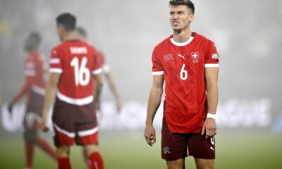 Switzerland's Christian Witzig, right, during the UEFA Nations League, group A4, soccer match between Switzerland and Denmark in St. Gallen, Switzerland, Tuesday, Oct. 15, 2024. (Gian Ehrenzeller/Keystone via AP)