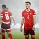 Switzerland's Christian Witzig, right, during the UEFA Nations League, group A4, soccer match between Switzerland and Denmark in St. Gallen, Switzerland, Tuesday, Oct. 15, 2024. (Gian Ehrenzeller/Keystone via AP)