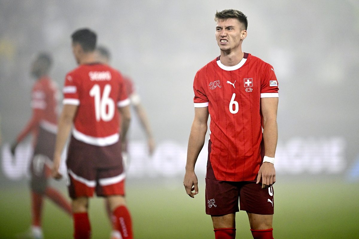 Switzerland's Christian Witzig, right, during the UEFA Nations League, group A4, soccer match between Switzerland and Denmark in St. Gallen, Switzerland, Tuesday, Oct. 15, 2024. (Gian Ehrenzeller/Keystone via AP)