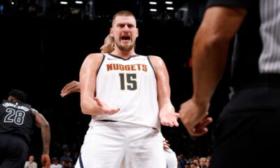 Denver Nuggets' Nikola Jokic (15), of Serbia, reacts to a call during the third quarter of an NBA basketball game against the Brooklyn Nets, Tuesday, Oct. 29, 2024, in New York. (AP Photo/Jason DeCrow)