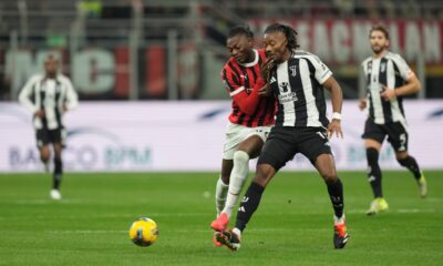 AC Milan's Rafael Leao, left, and Juventus' Khephren Thuram fight for the ball during the Serie A soccer match between AC Milan and Juventus at the San Siro stadium in Milan, Italy, Saturday, Nov. 23, 2024. (AP Photo/Antonio Calanni)