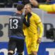 Kosovo's Amir Rrahmani, left, argues with Romania's Denis Alibec during the UEFA Nations League soccer match between Romania and Kosovo at the National Arena stadium in Bucharest, Romania, Saturday, Nov. 16, 2024. (AP Photo/Alexandru Dobre)