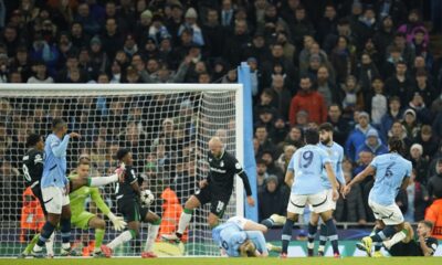 The incident that led to Manchester City's penalty during the Champions League opening phase soccer match between Manchester City and Feyenoord at the Etihad Stadium in Manchester, England, Tuesday, Nov. 26, 2024. (AP Photo/Dave Thompson)