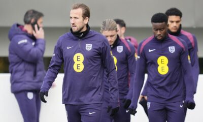 England's Harry Kane, left, looks on during a training session at St George's Park, Burton upon Trent, England, Wednesday Nov. 13, 2024. (Nick Potts/PA via AP)