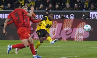 Dortmund's Jamie Gittens scores the opening goal during the German Bundesliga soccer match between Borussia Dortmund and Bayern Munich at the Signal-Iduna Park in Dortmund, Germany, Saturday, Nov. 30, 2024. (AP Photo/Martin Meissner)