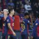 Barcelona's Dani Olmo, left, celebrates with Barcelona's Robert Lewandowski after scoring his side's opening goal during a Spanish La Liga soccer match between Barcelona and Espanyol at the Lluis Companys Olympic Stadium in Barcelona, Spain, Sunday, Nov. 3, 2024. (AP Photo/Joan Monfort)